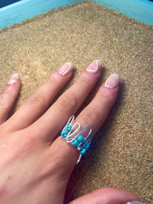 Silver and teal wavy ring