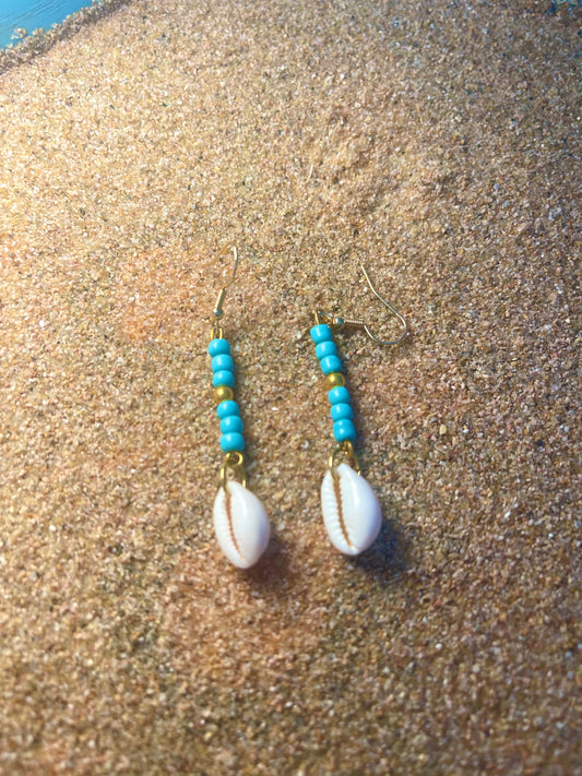 Blue and gold beaded Earrings with a cowrie shell