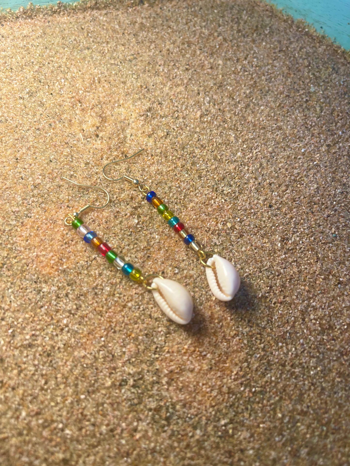 Rainbow beaded Gold Earrings with a cowrie shell