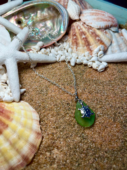 Silver necklace with green sea glass and a silver turtle