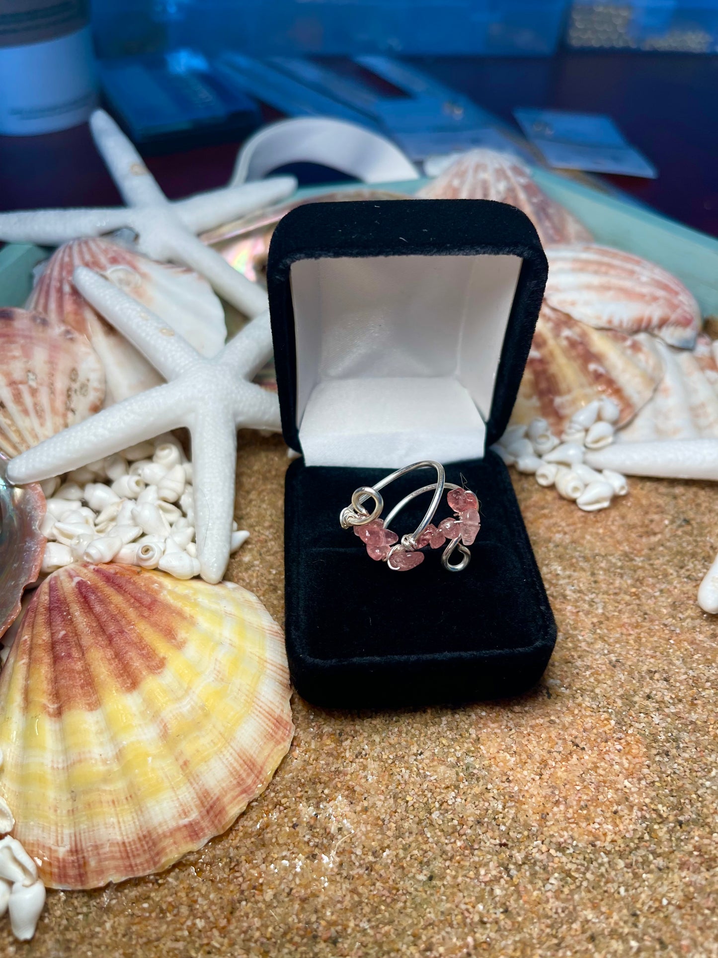 Silver spiral and light pink stones ring