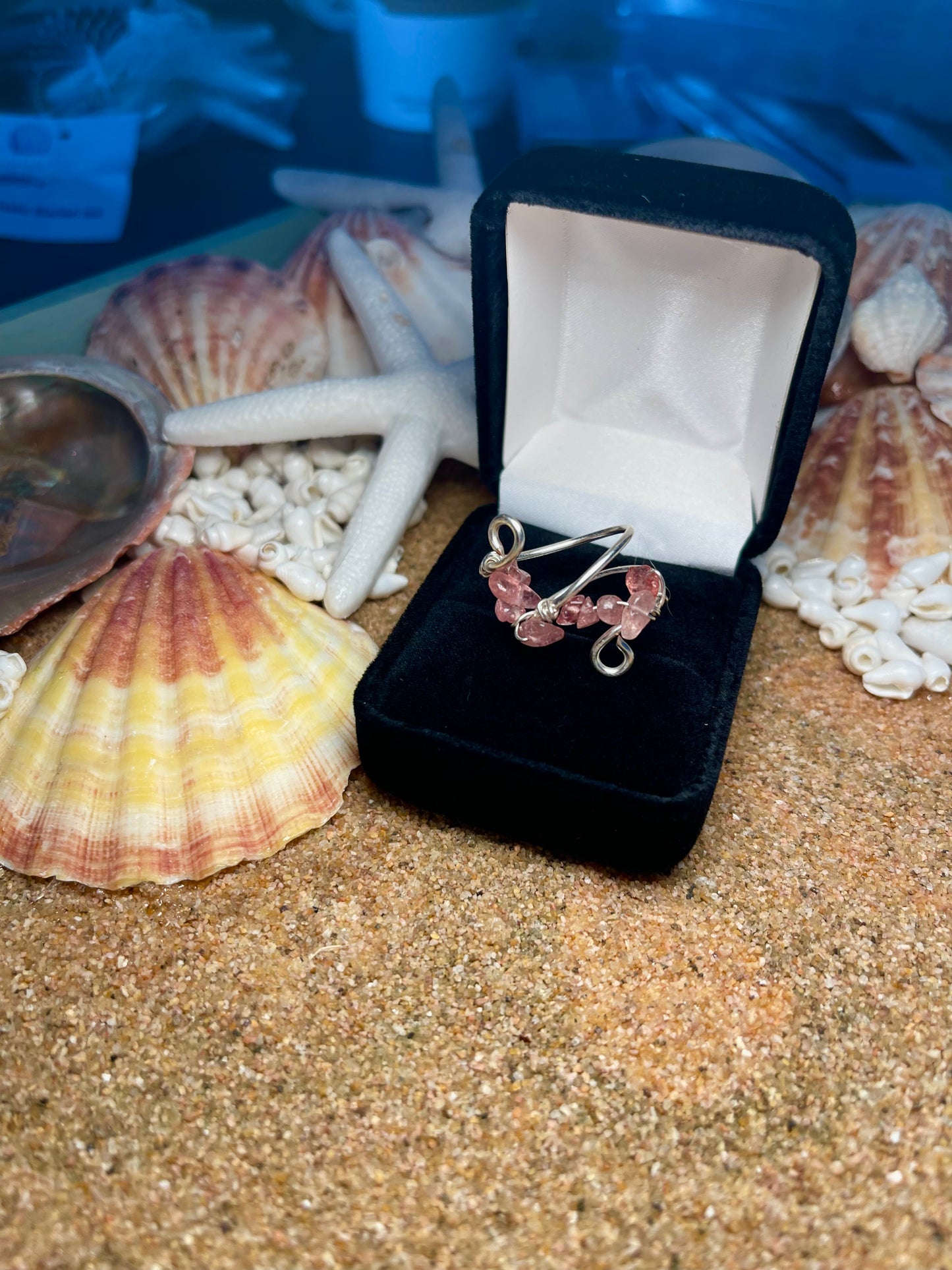 Silver spiral and light pink stones ring