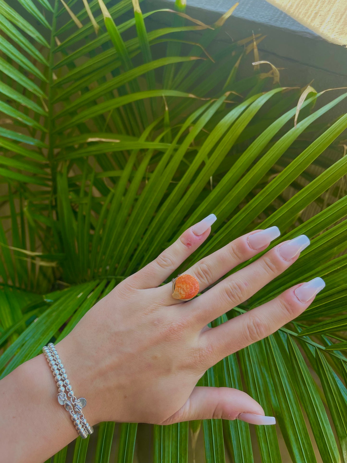 Bright orange seashell ring