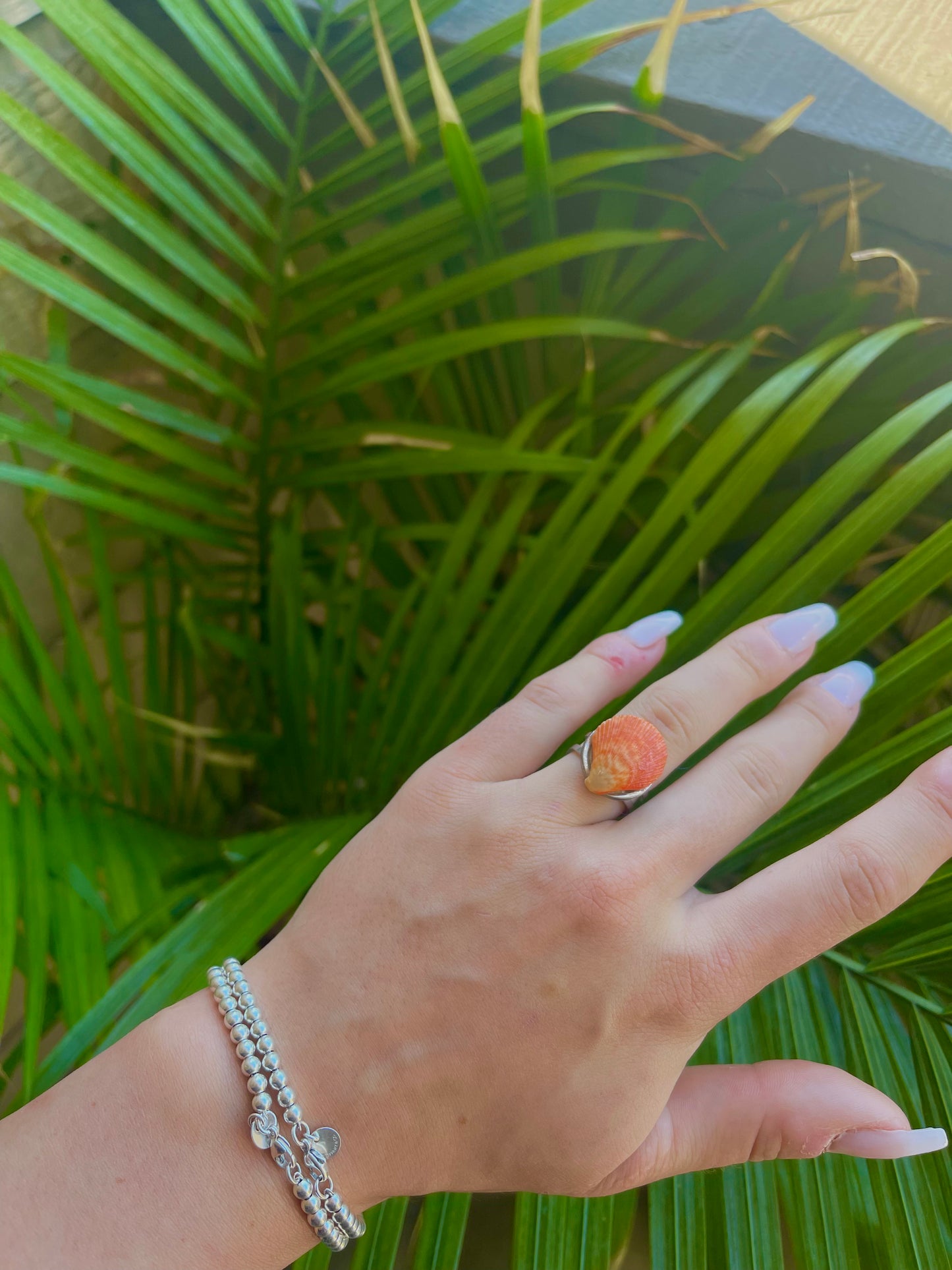 Bright orange seashell ring