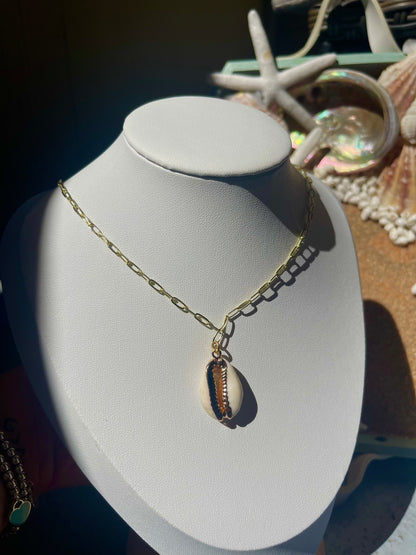 Gold cowry shell necklace