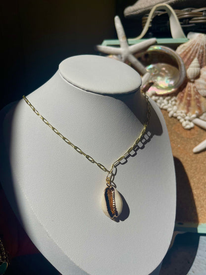 Gold cowry shell necklace