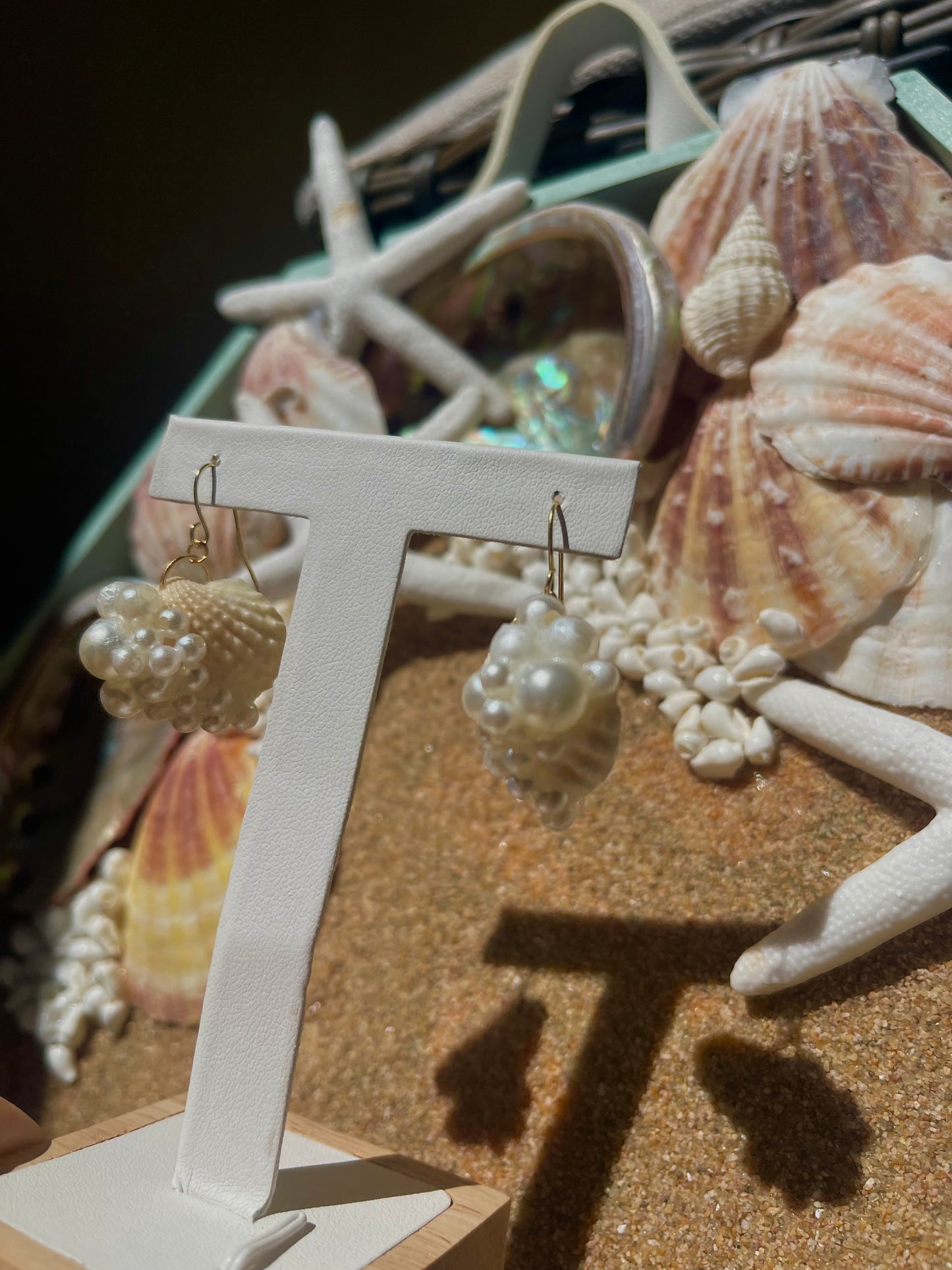 Gold seashell and pearl earrings