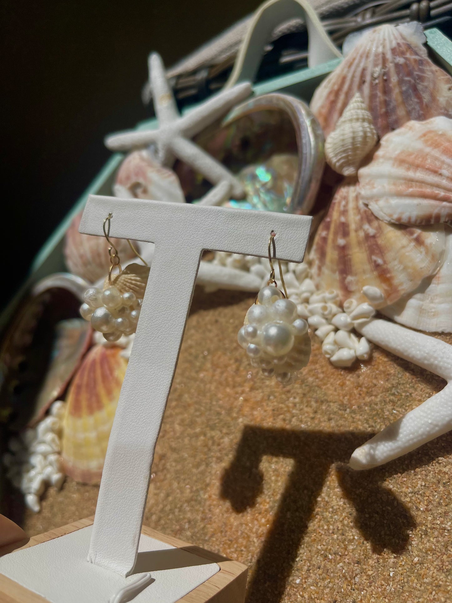 Gold seashell and pearl earrings